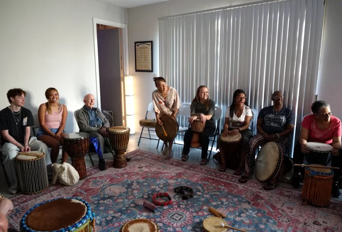 A collection of crystal singing bowls and tuning forks prepared for a sound healing journey in Richardson.